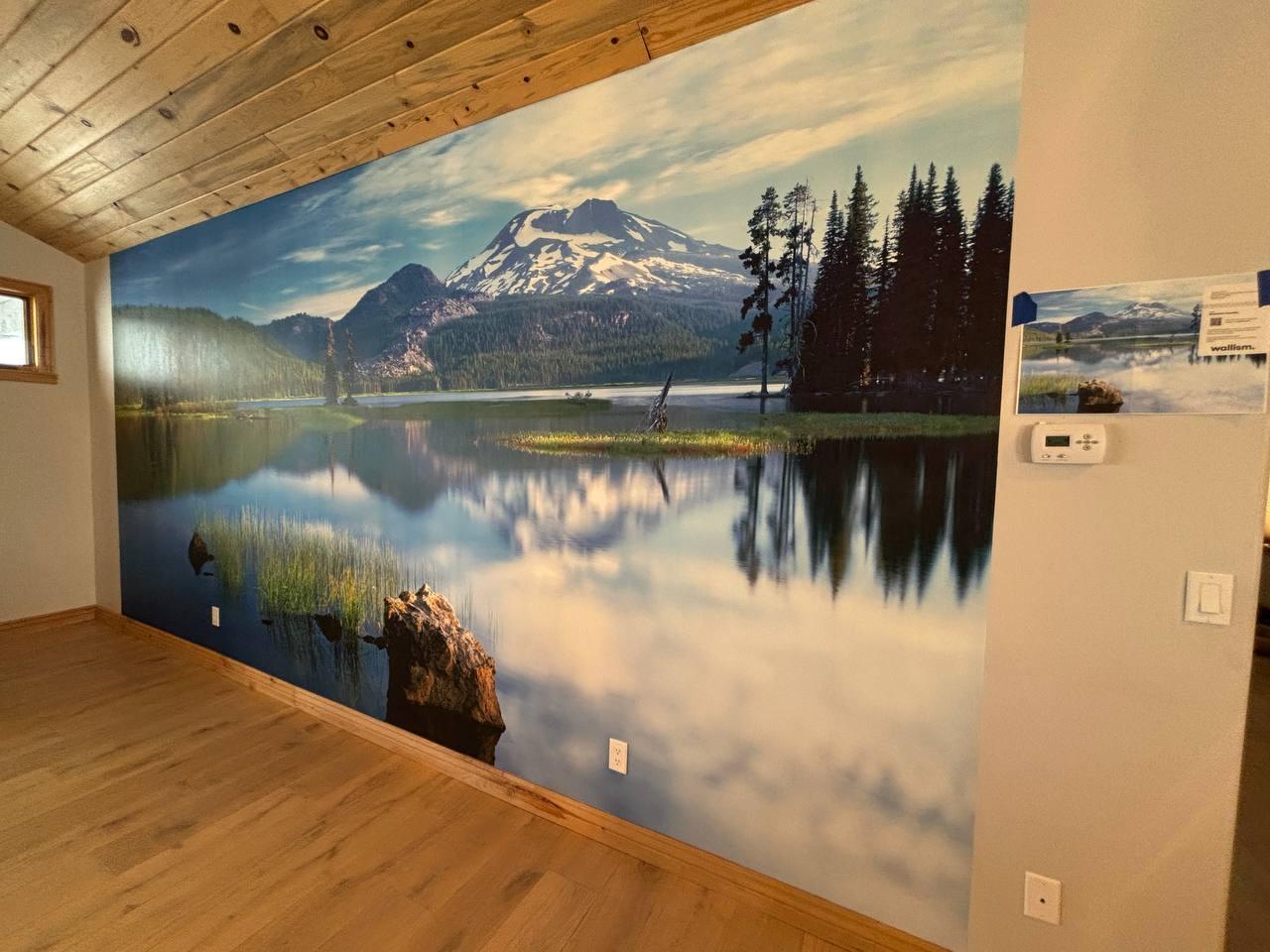 Mountain landscape mural wallpaper installed in interior space