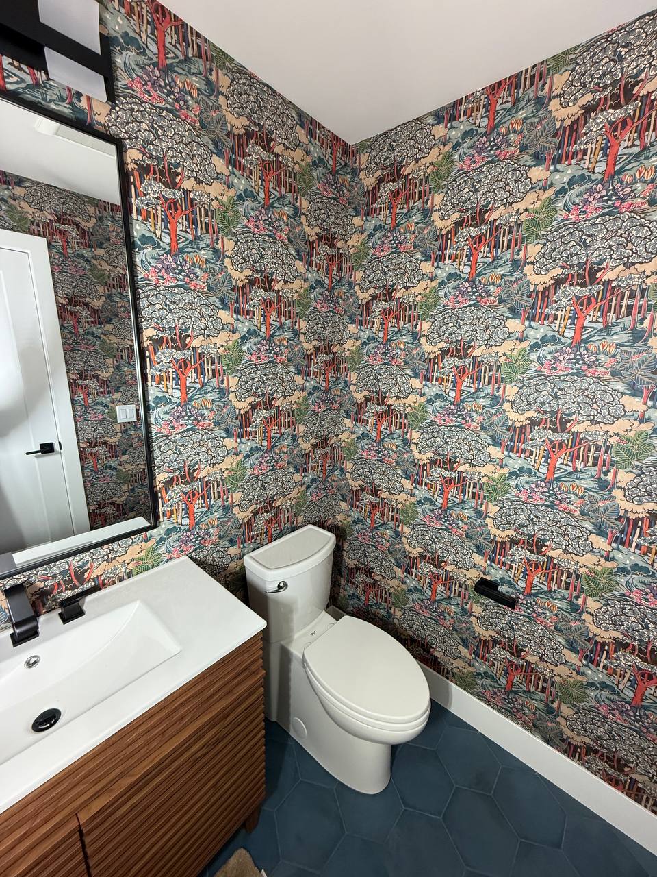 Professional wallpaper installation in modern living room with perfectly aligned seams