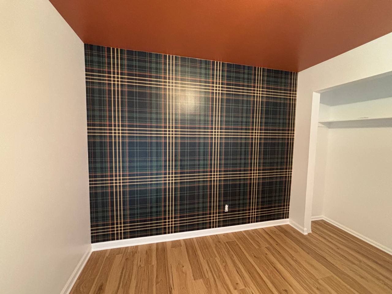 Professional wall decoration with textured wallpaper installation