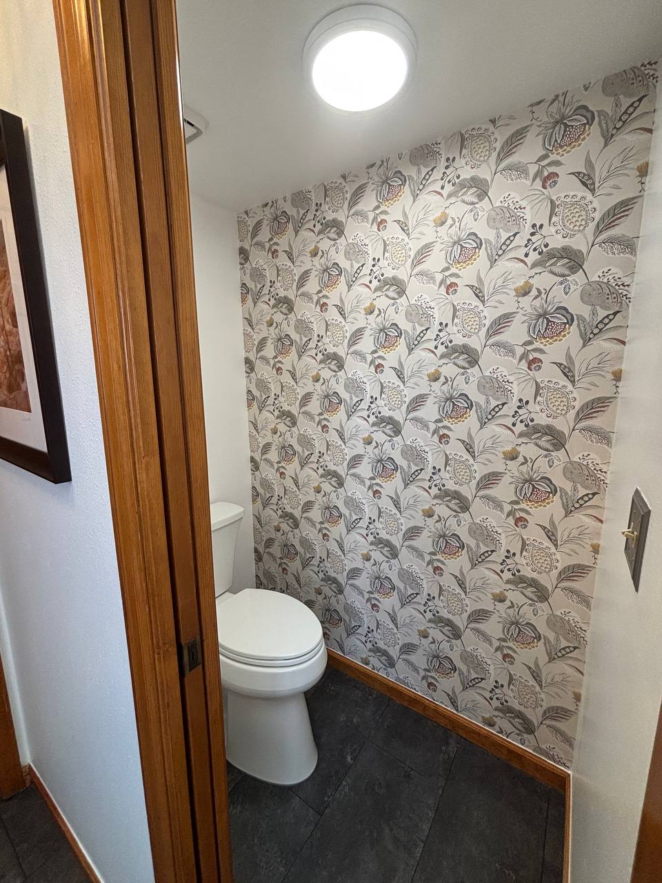 Residential wall finishing with professionally applied wallpaper