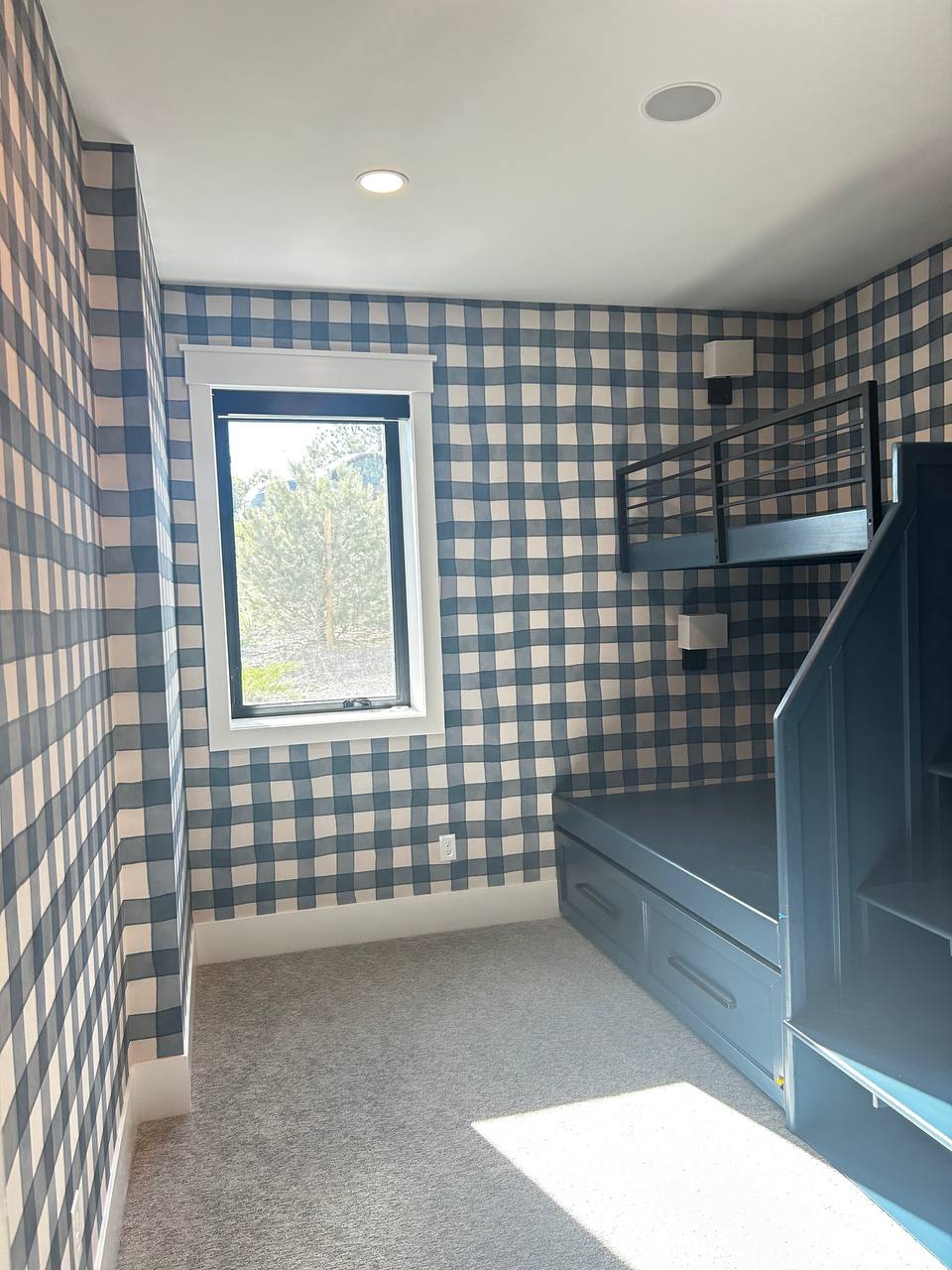 Finished wallpaper installation with clean edges and aligned patterns